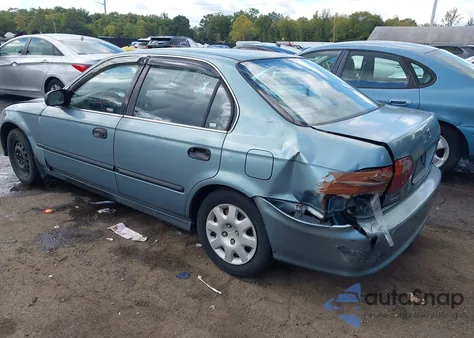 2000 Honda Civic Lx z USA, uszkodzony, nr VIN 1HGEJ6678YL057178